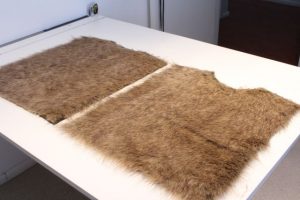 Back and front of faux fur vest