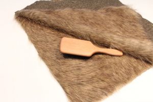 Brush fur inwards on faux fur vest