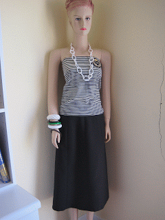 Longer Length Skirt with Badge and Clip Necklace