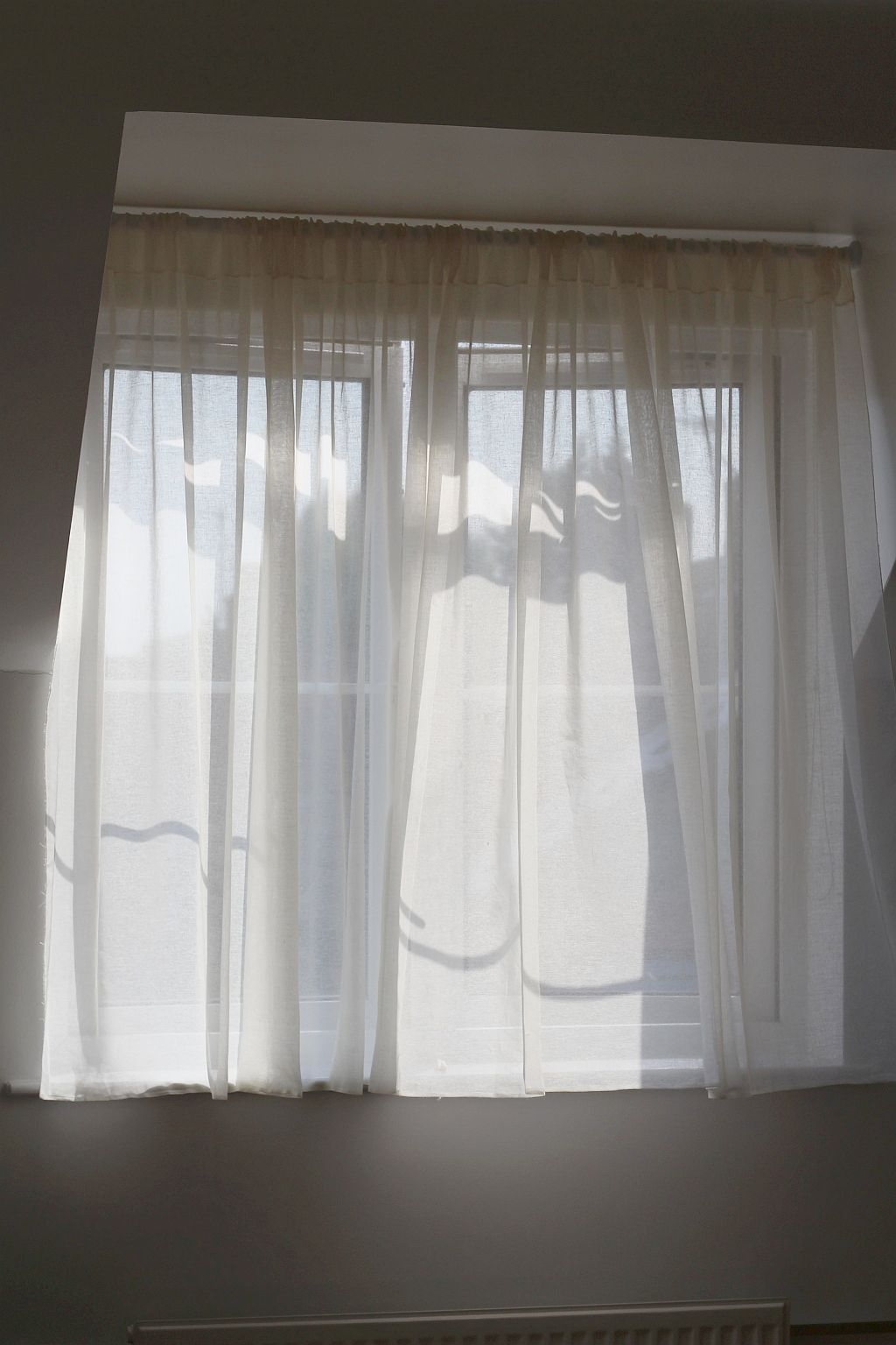 Muslin curtains with a slot